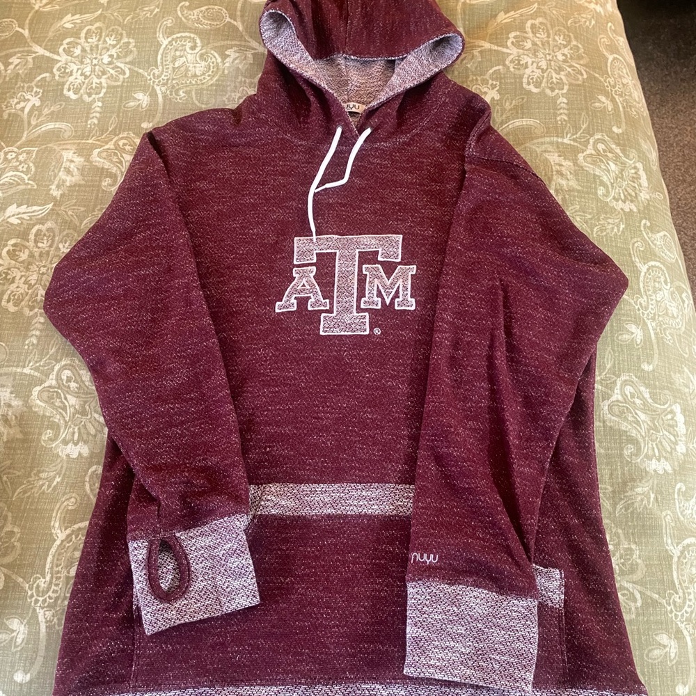 Official Texas A&M light sweater/jacket. Size appropriate, long torso.